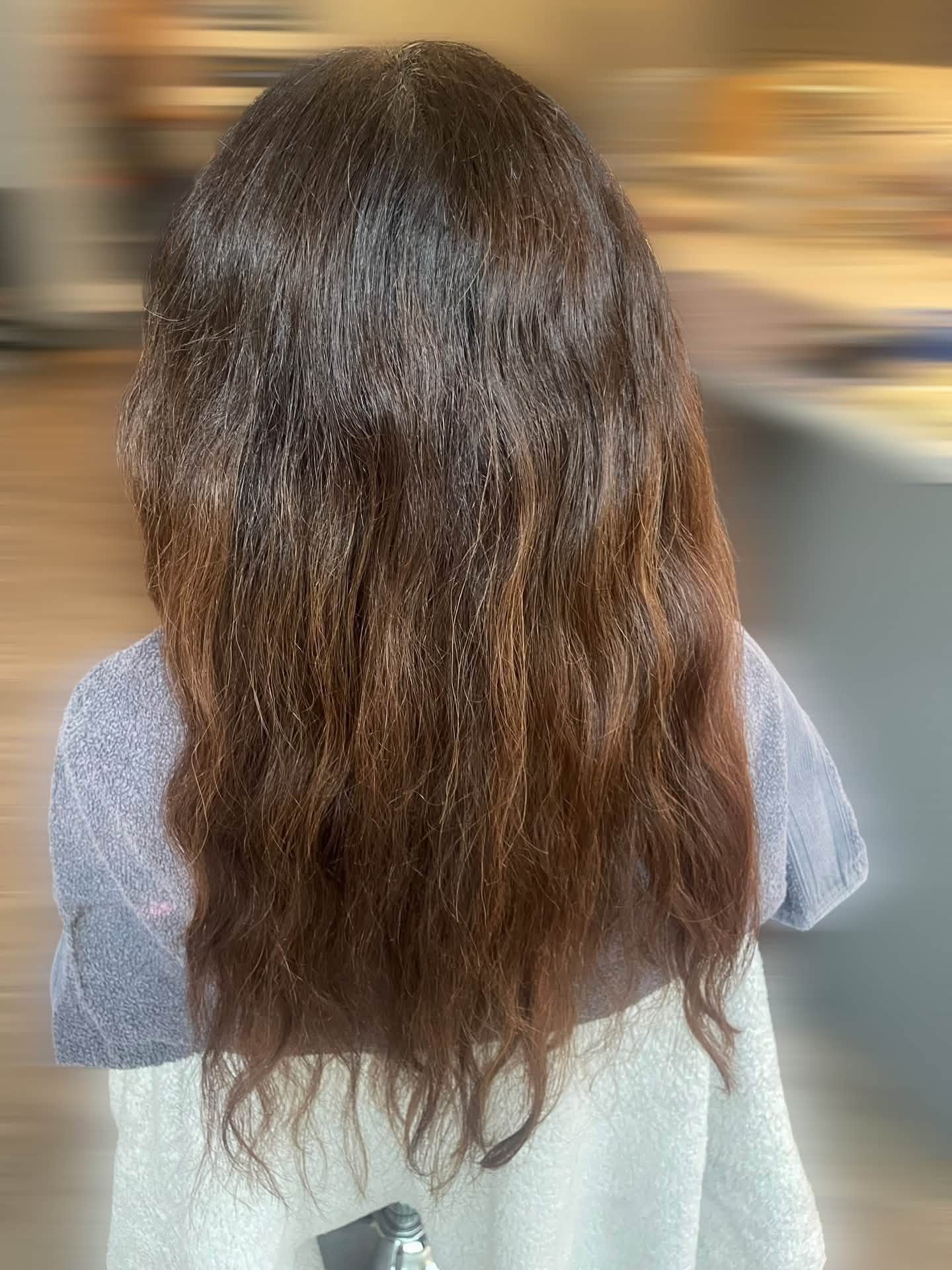 Long brunette hair photographed from the back