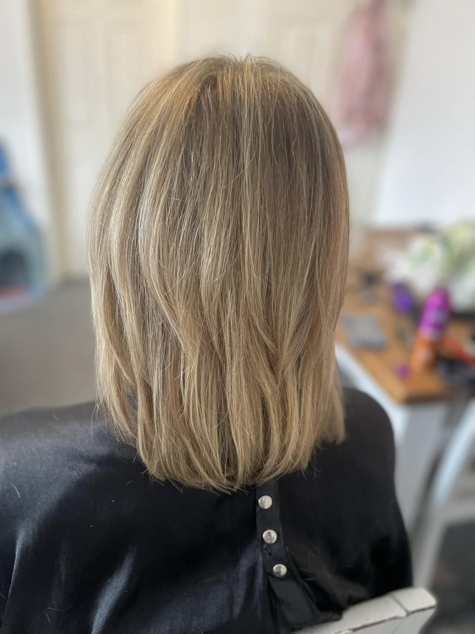 Straight shoulder-length blonde hair